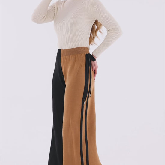 triko-siyah-sutlu-kahve-pantolon-model-video.mp4
